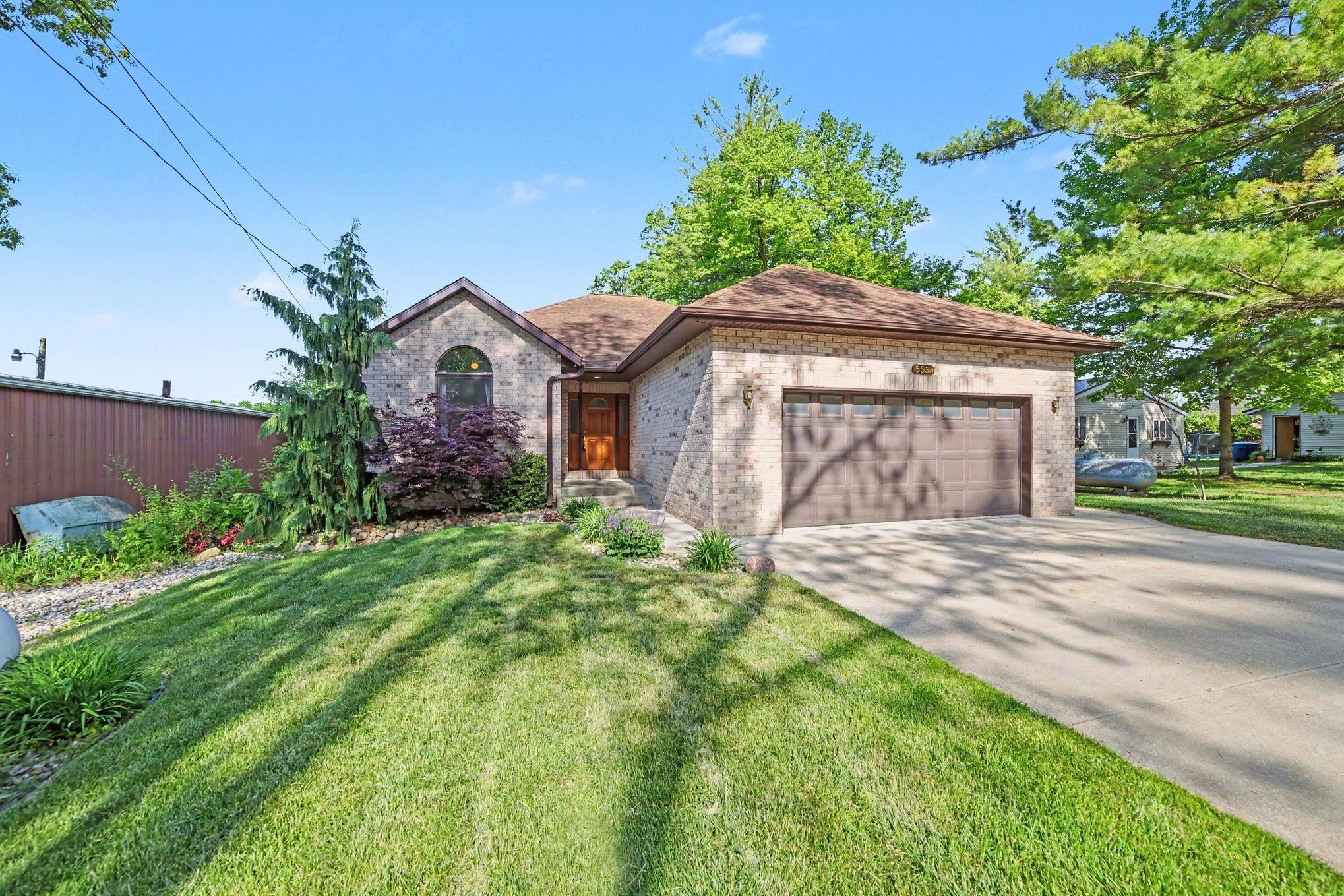 5531 N Clarence Court, Sanford MI 48657 photo 1