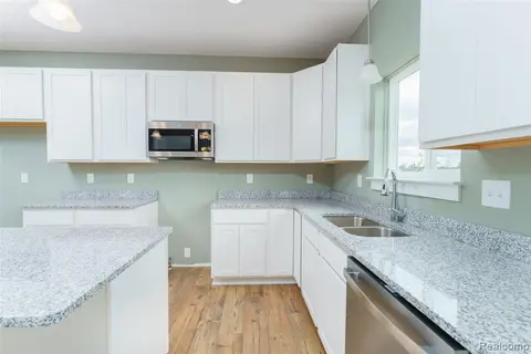 570 W Wildwood Drive, Owosso MI 48867 9119 photo 3