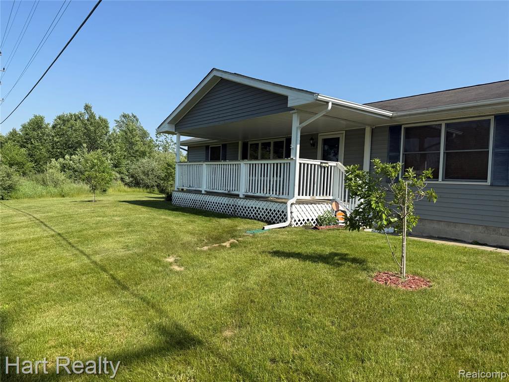 909 W Barnes Road, Fostoria MI 48435 9713 photo 1