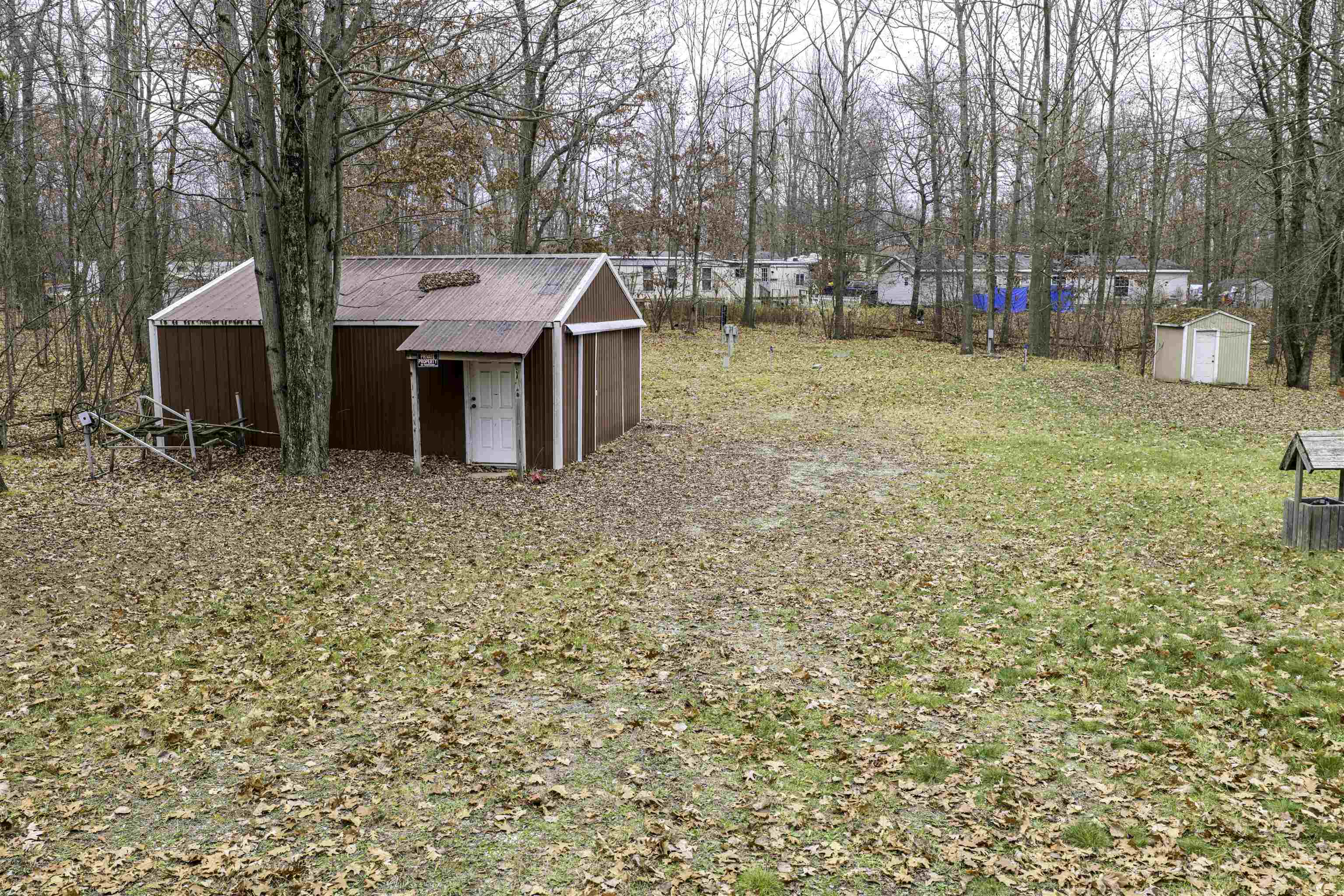7737 Wilderness Drive, Weidman MI 48893-9739 photo 1