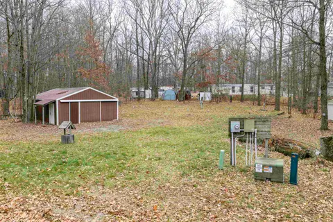 7737 Wilderness Drive, Weidman MI 48893-9739 photo 2